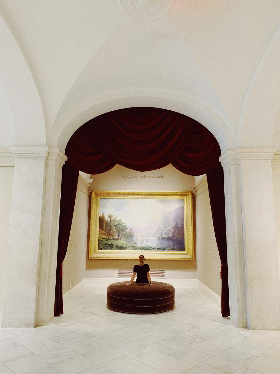 washington woman sitting on brown sofa dc 20004